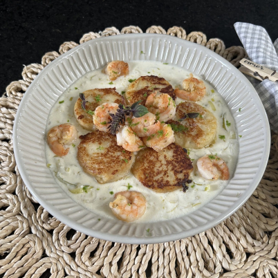 Nhoque Alla Romana com camar�es e fondue de alho-por�